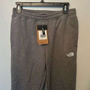 The North Face men’s sweatpants. Size Small. New With Tags. Color grey.